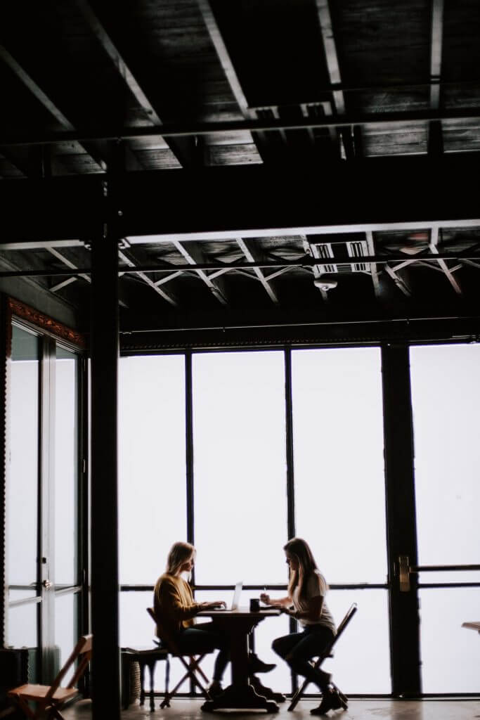 people working at a table