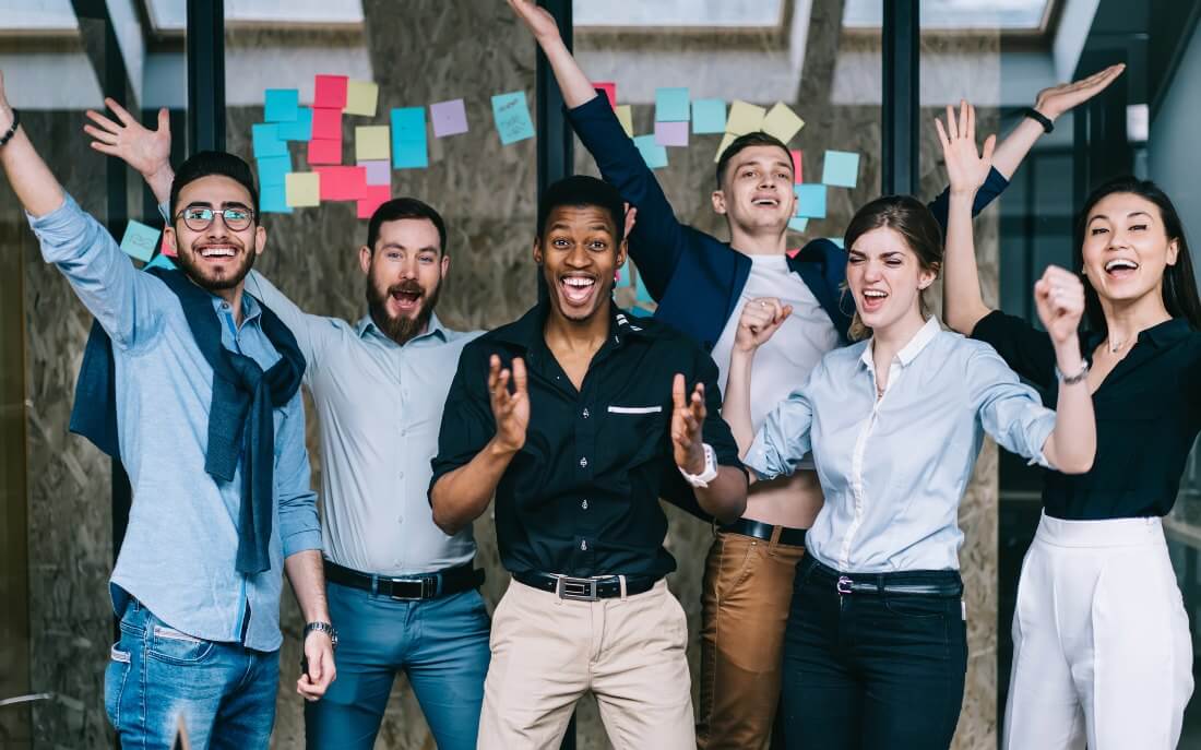 A group of happy employees working together