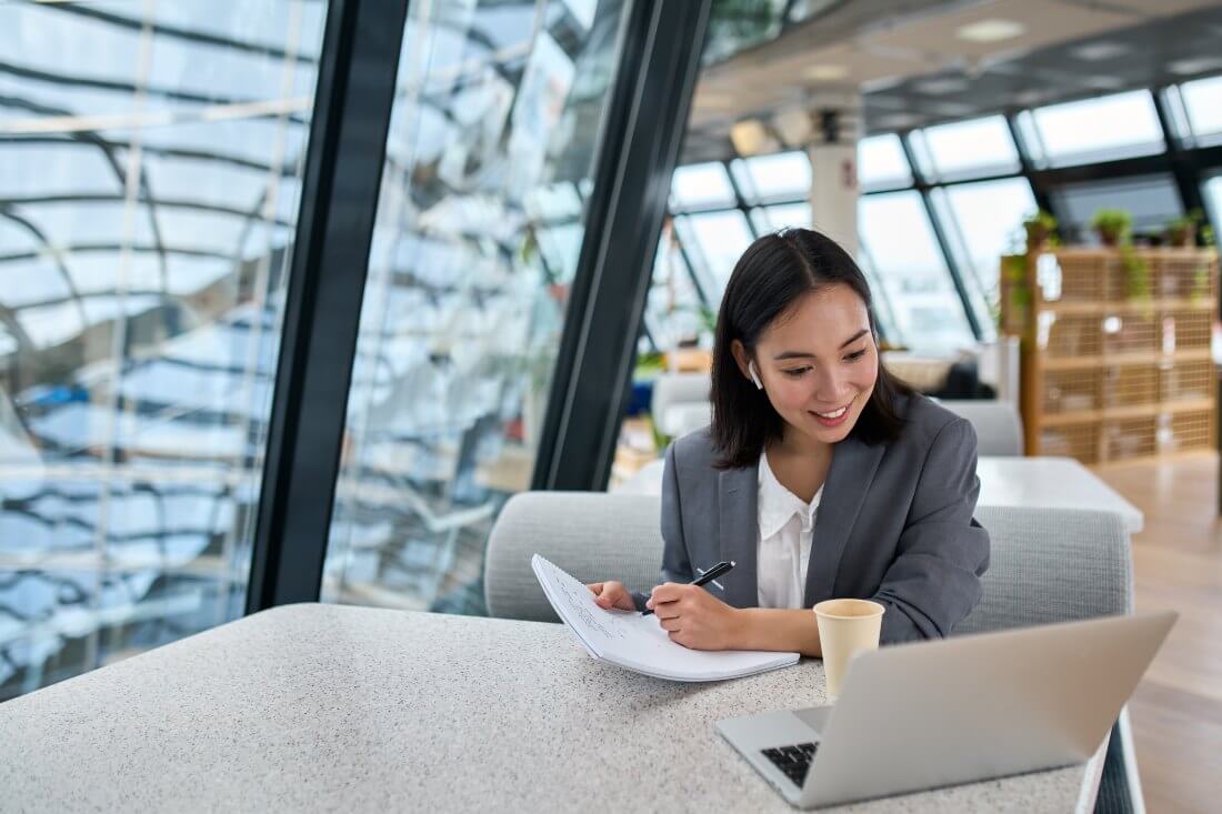 lady working hybrid in an office